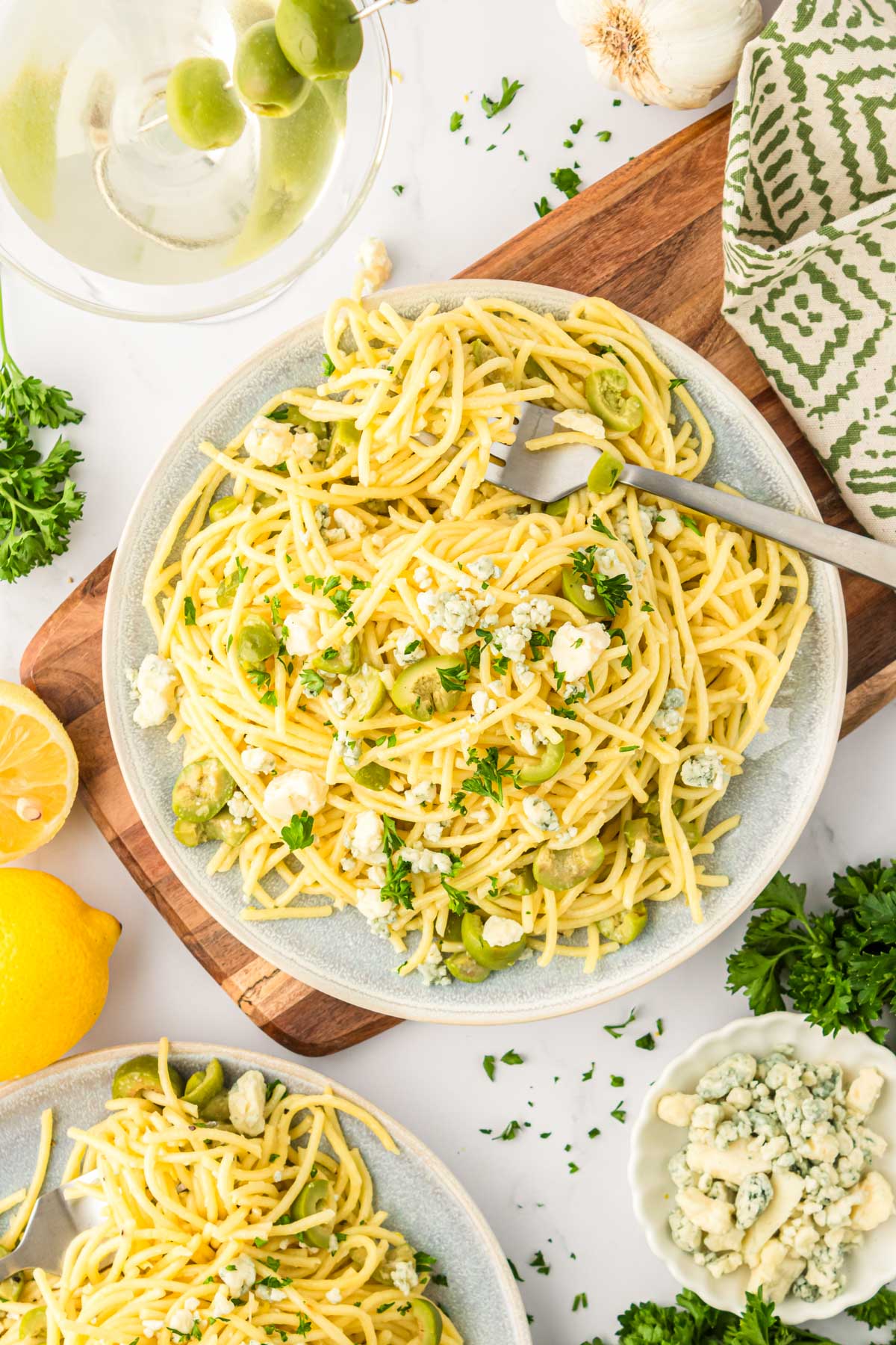 Overhead photo of Dirty Martini pasta on a table ready to enjoy.