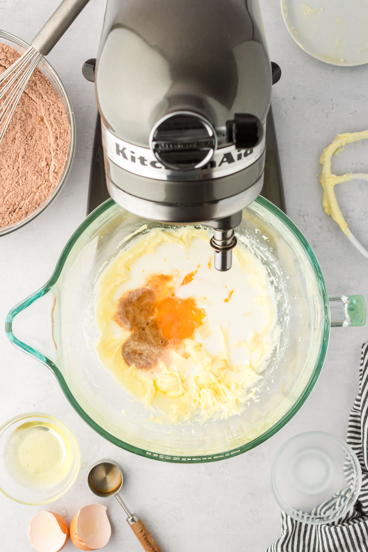 Cookie dough being made in a stand mixer.