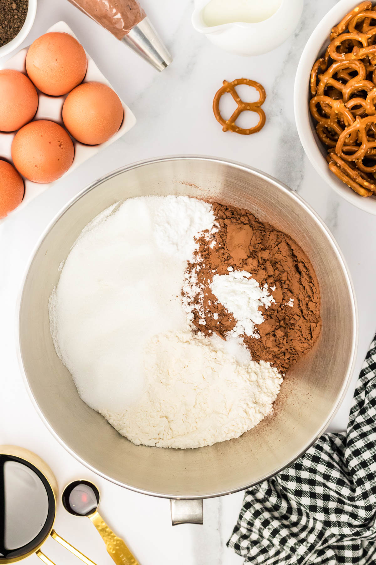 Dry ingredients to make chocolate cupcakes in a mixing bowl.