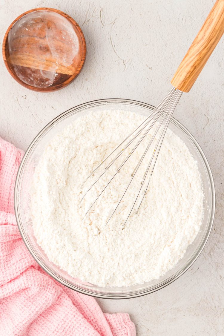 Dry ingredients to make yellow cupcakes in a bowl.