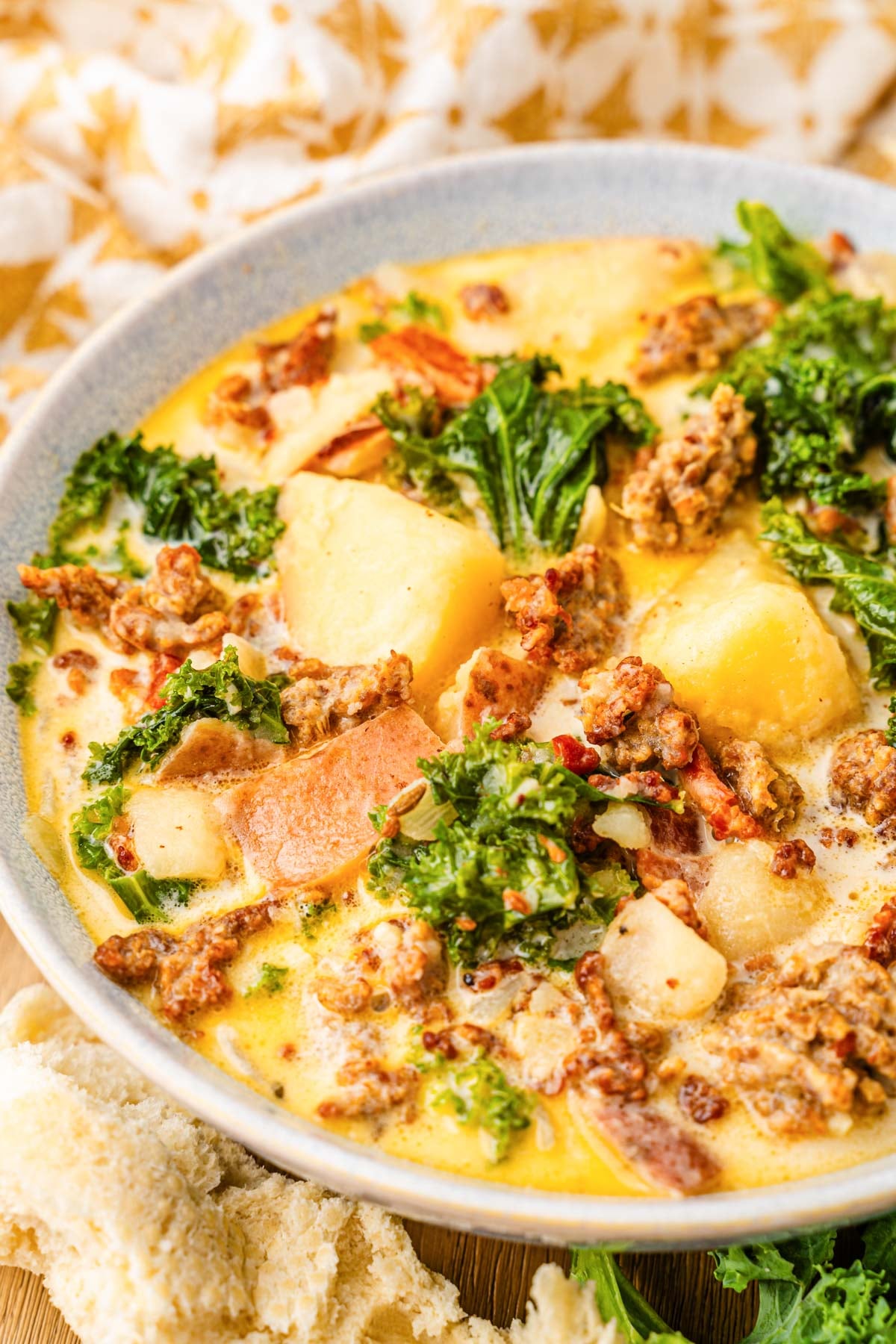 A bowl of Zuppa Toscana soup in a bowl.