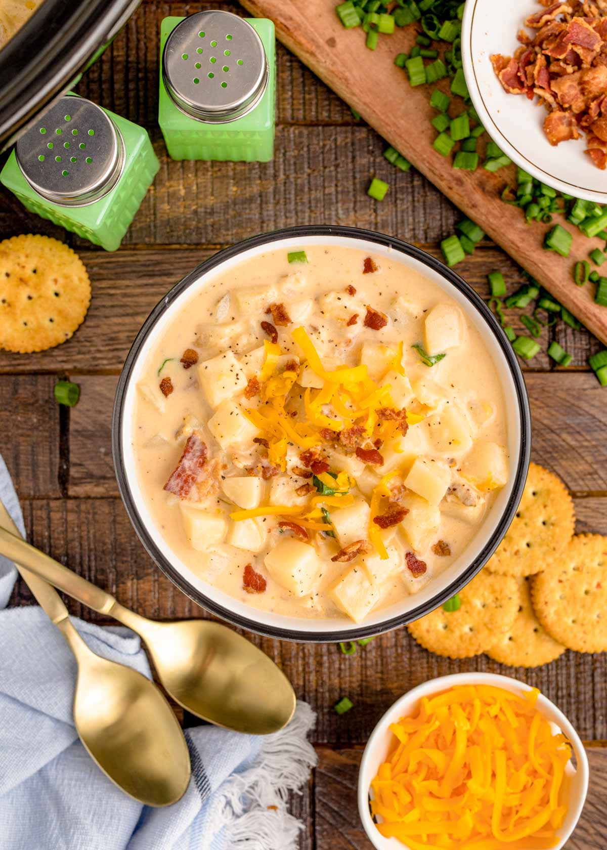 Overhead photo of a bowl of potato soup made in the crockpot.