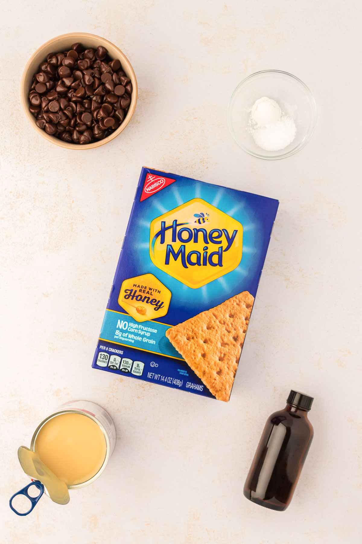 Ingredients to make graham cracker bars on a table.