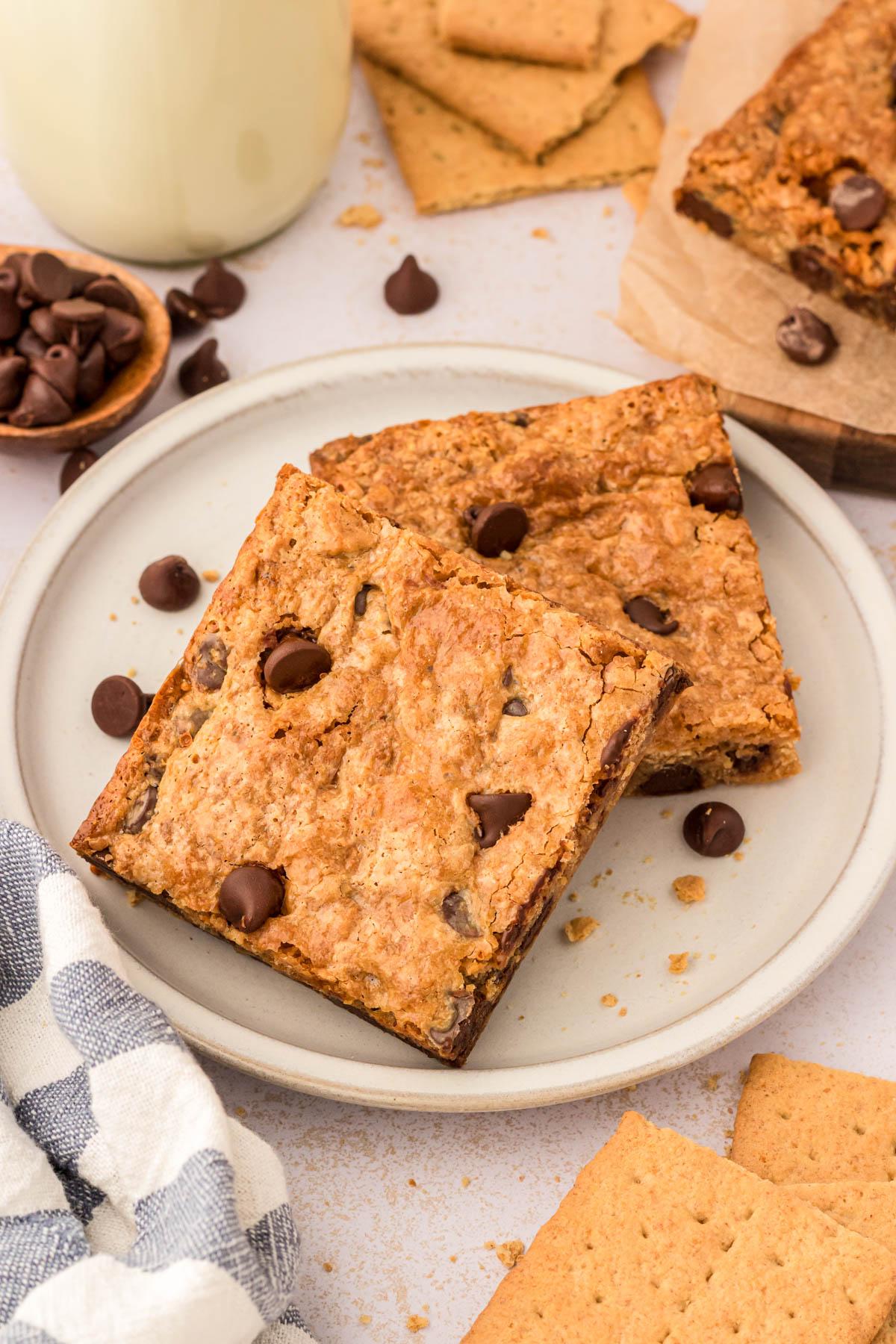 Two graham cracker bars on a white plate. 