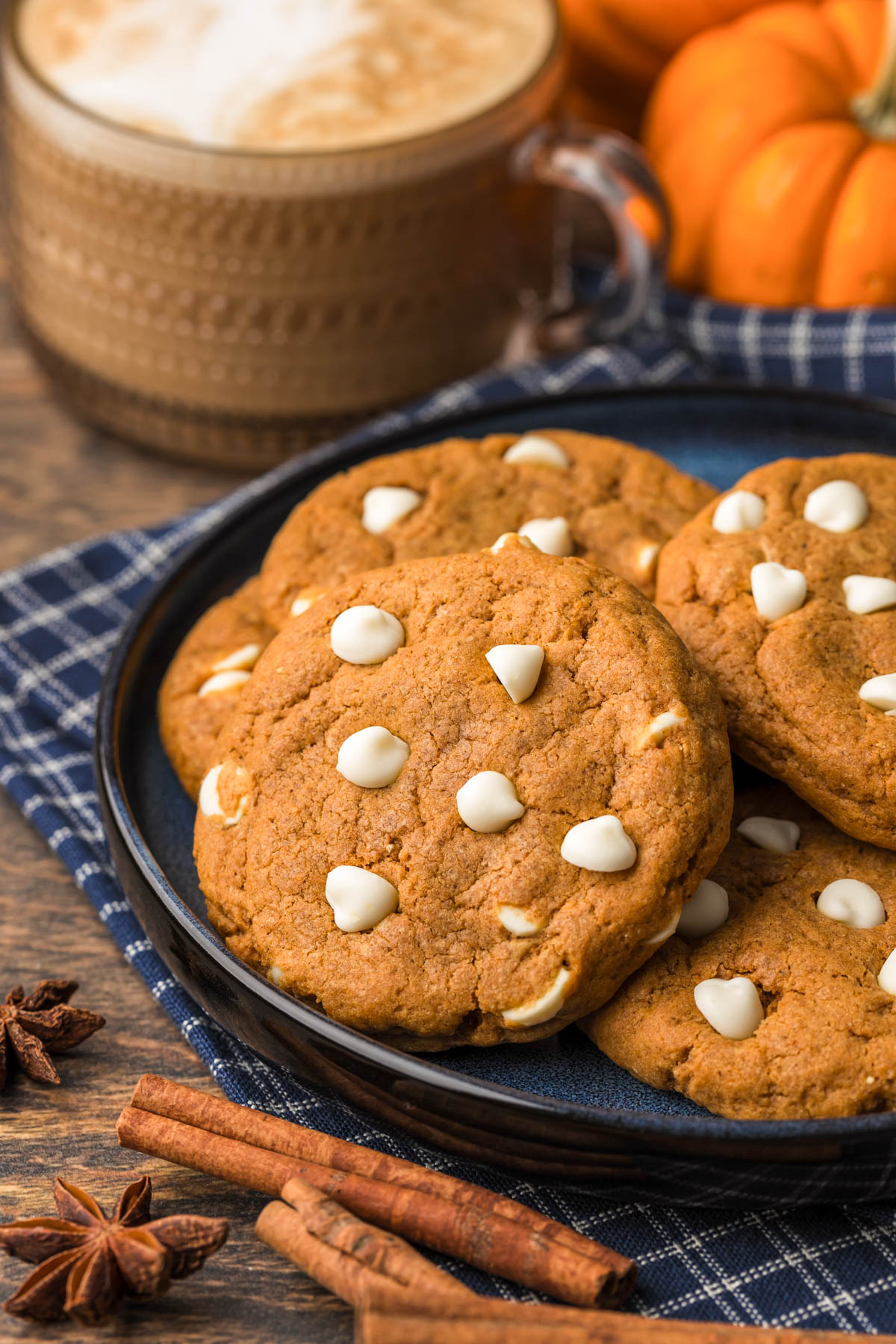 A plate of pumpkin white chocolate chip cookies.