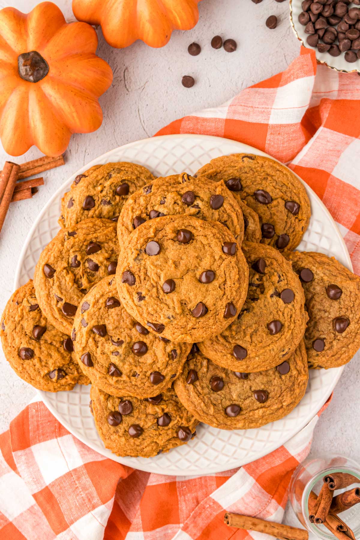 Overhead photo of a plate of pumpkin chocolate chip cookies.