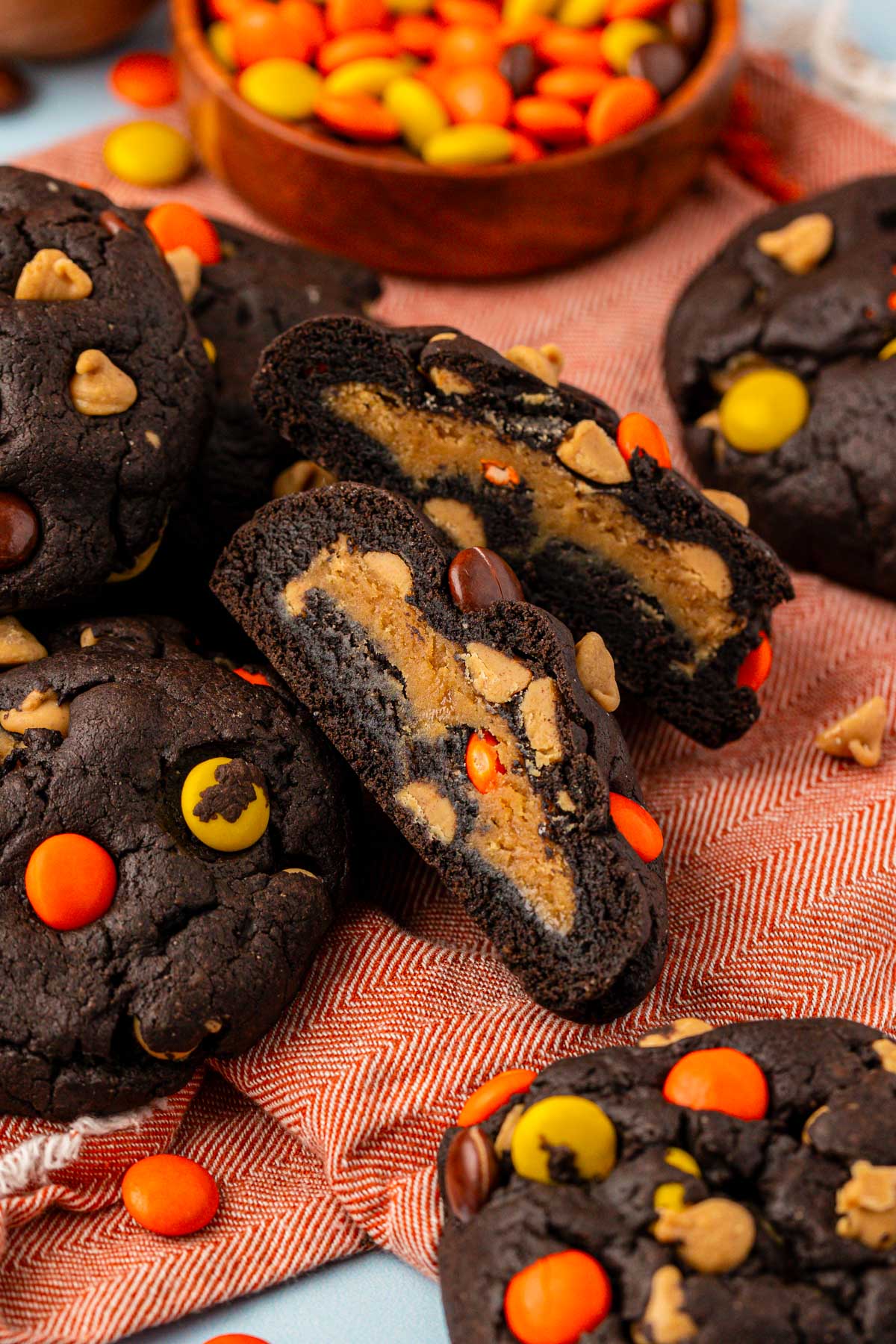 Chocolate peanut butter stuffed cookies on a table.