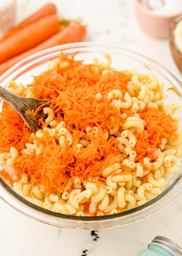 Hawaiian Pasta Salad being prepared in a bowl.