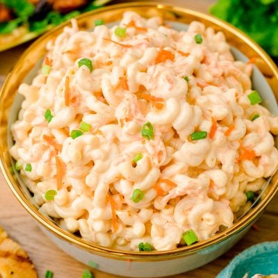 A bowl of Hawaiian macaroni salad on a wooden table.