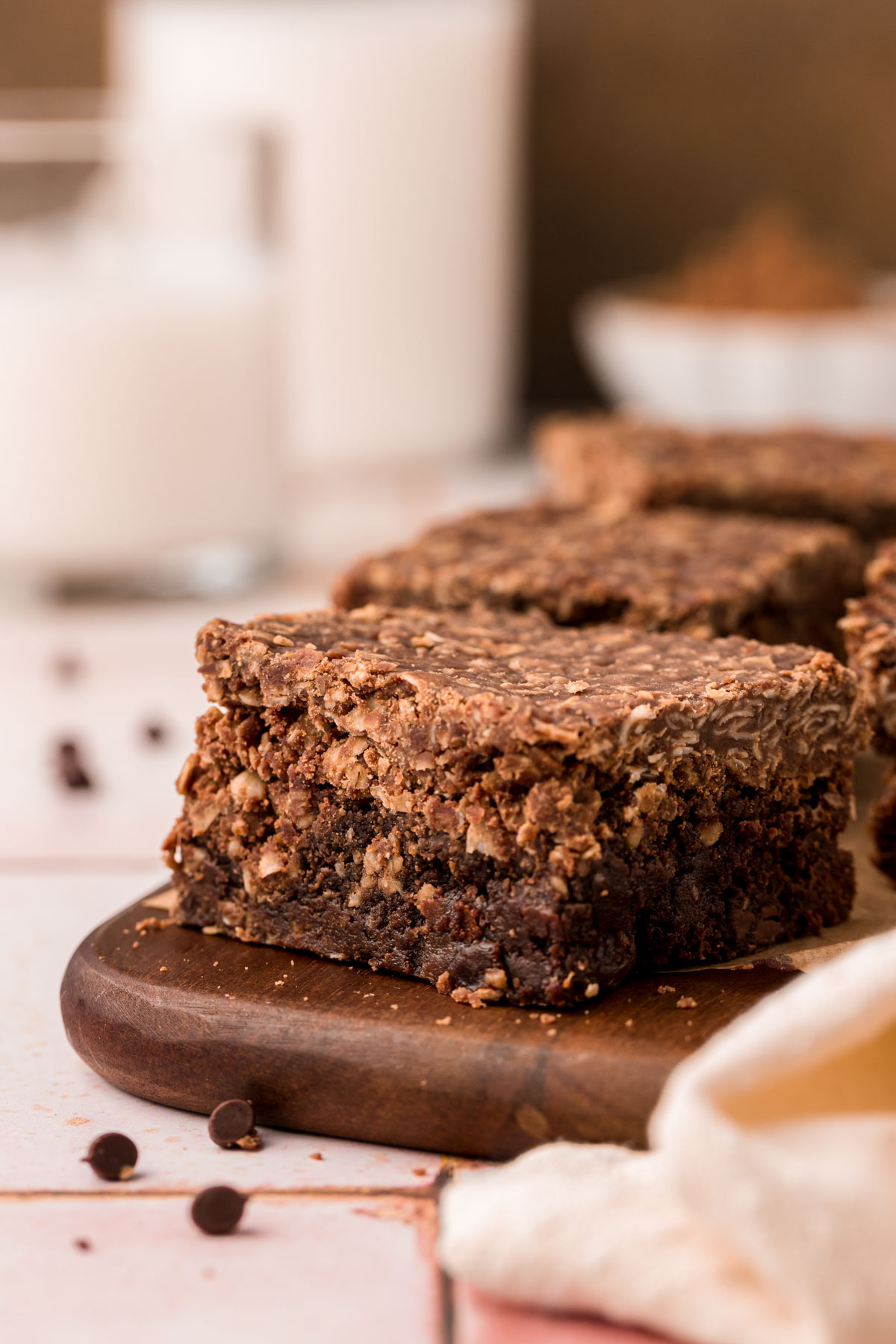 No bake cookie brownies on a wooden board.