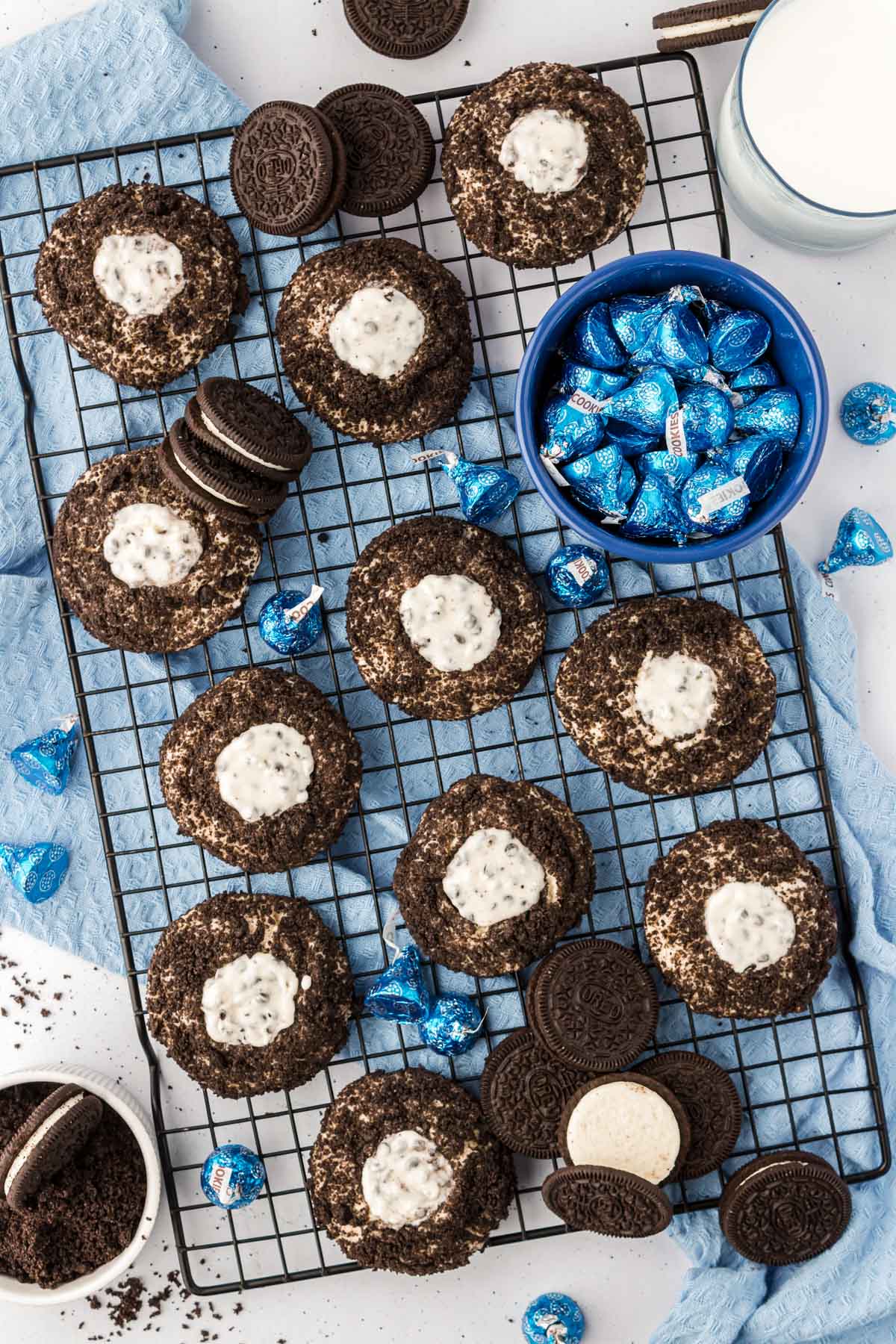 Overhead photo of Oreo thumbprint cookies on a wire rack.