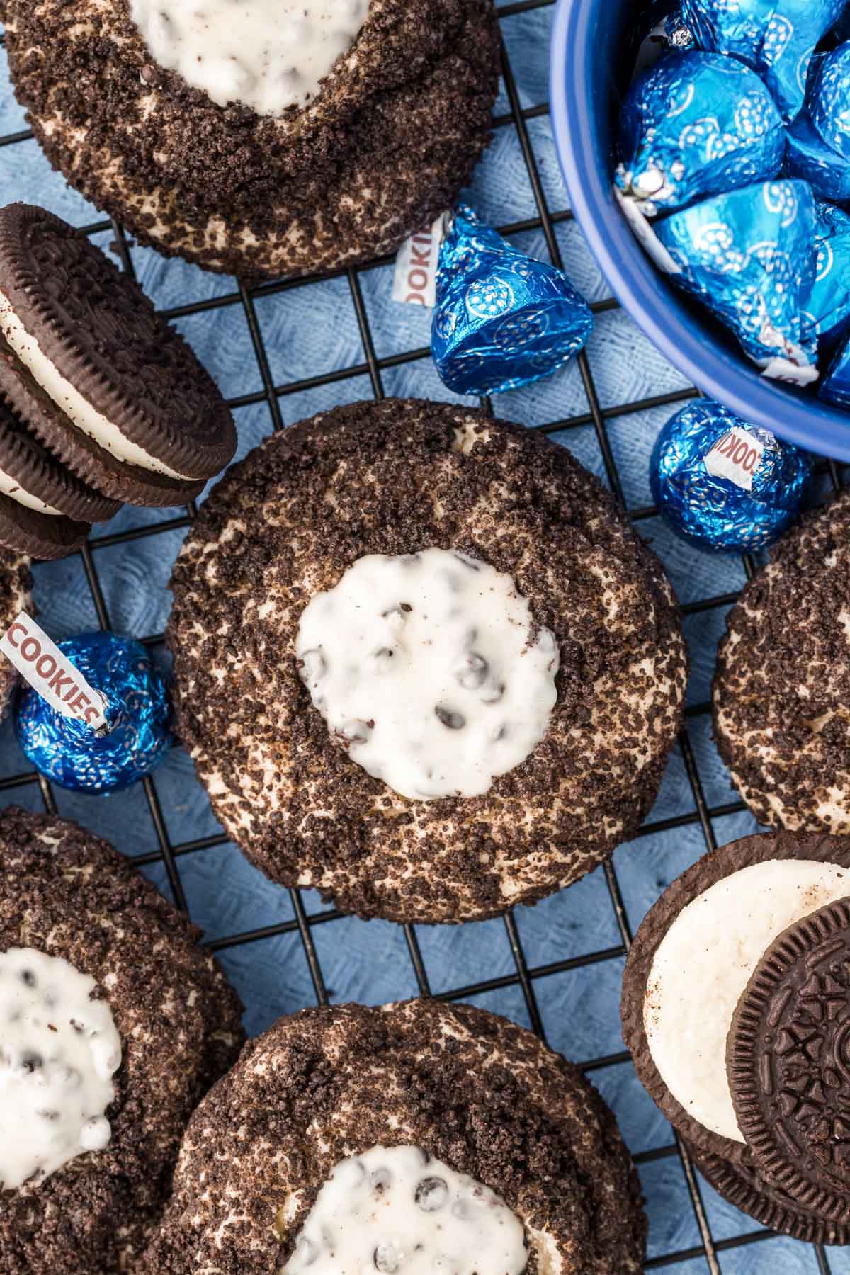 Overhead photo of Oreo thumbprint cookies on a wire rack.
