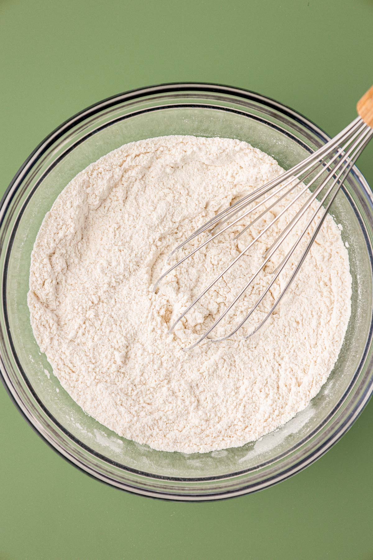 Dry ingredients being whisked together to make cookies.