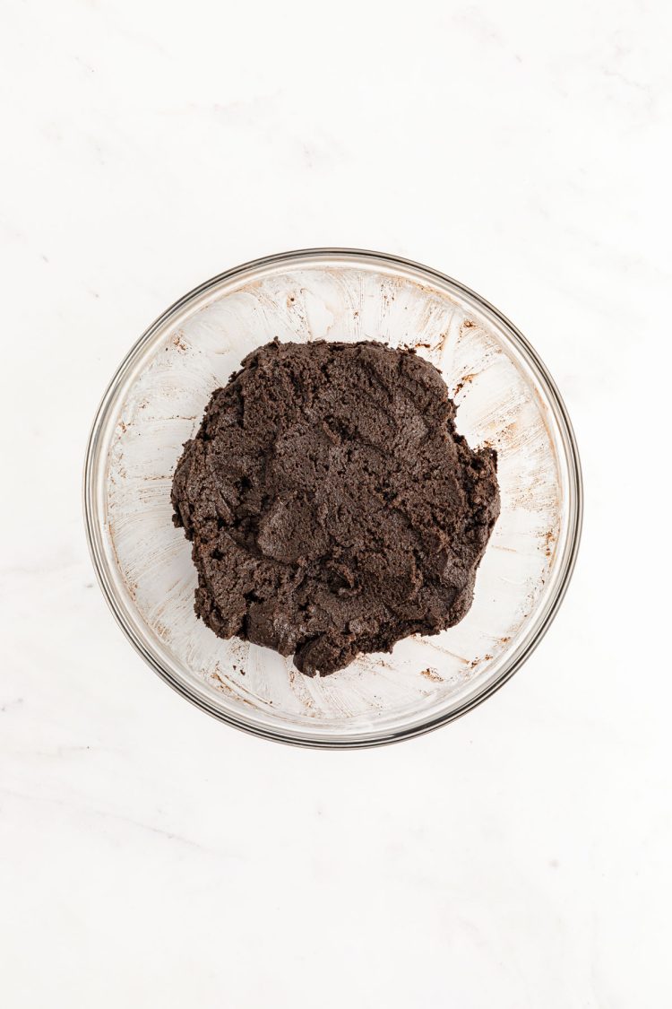 Oreo and cream cheese mixture in a glass bowl.