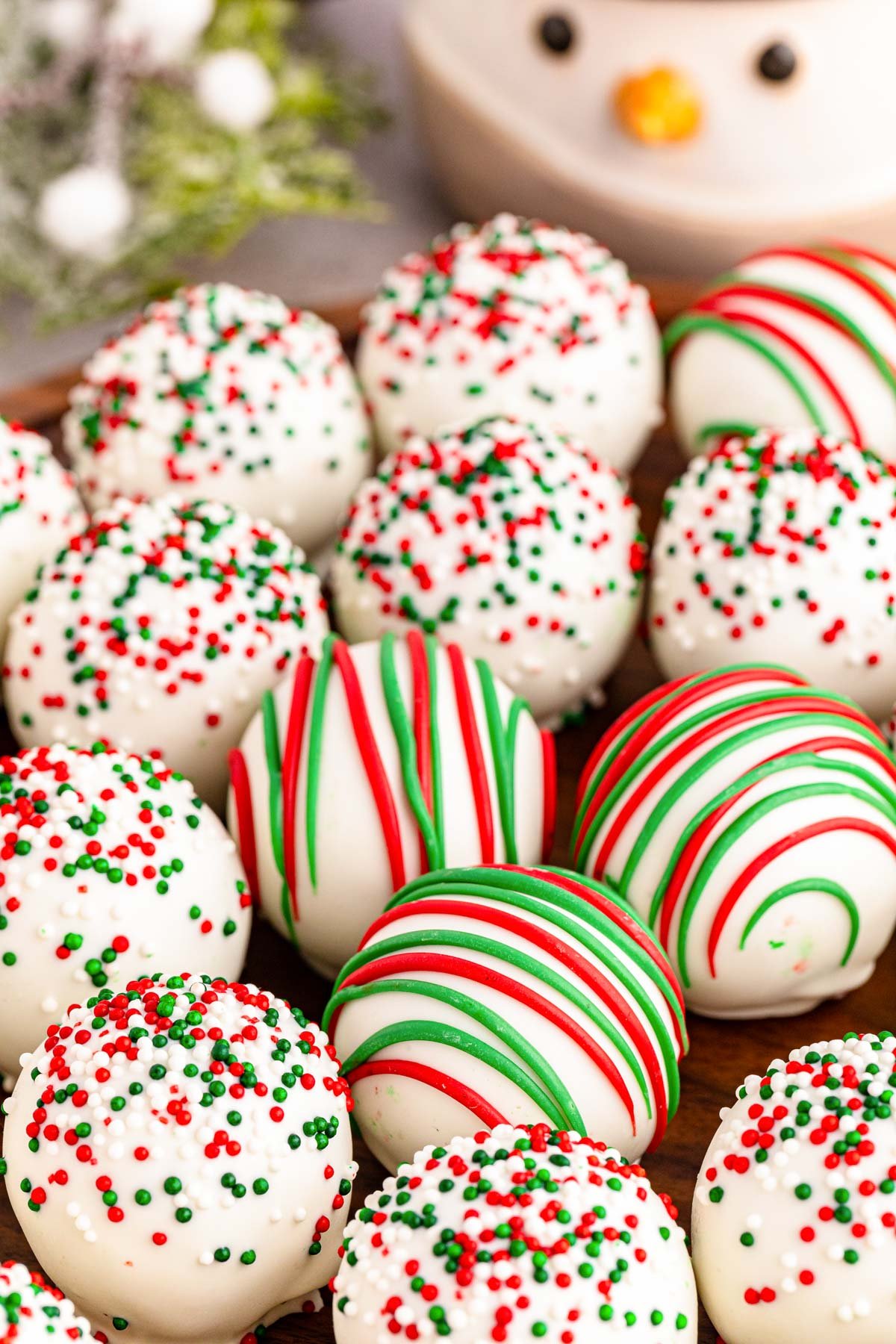 Sugar cookie truffles decorated for Christmas.