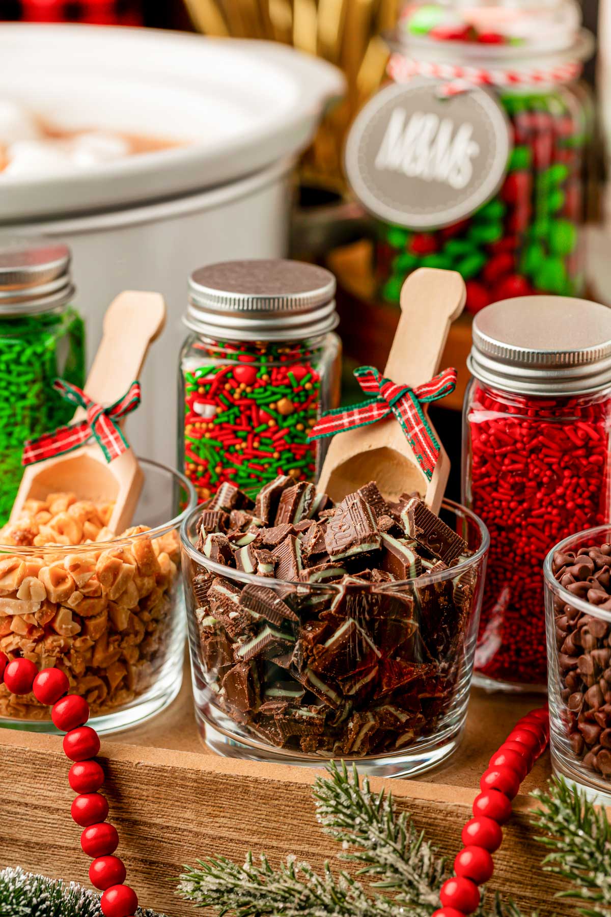 Toppings for a hot cocoa bar on a table.