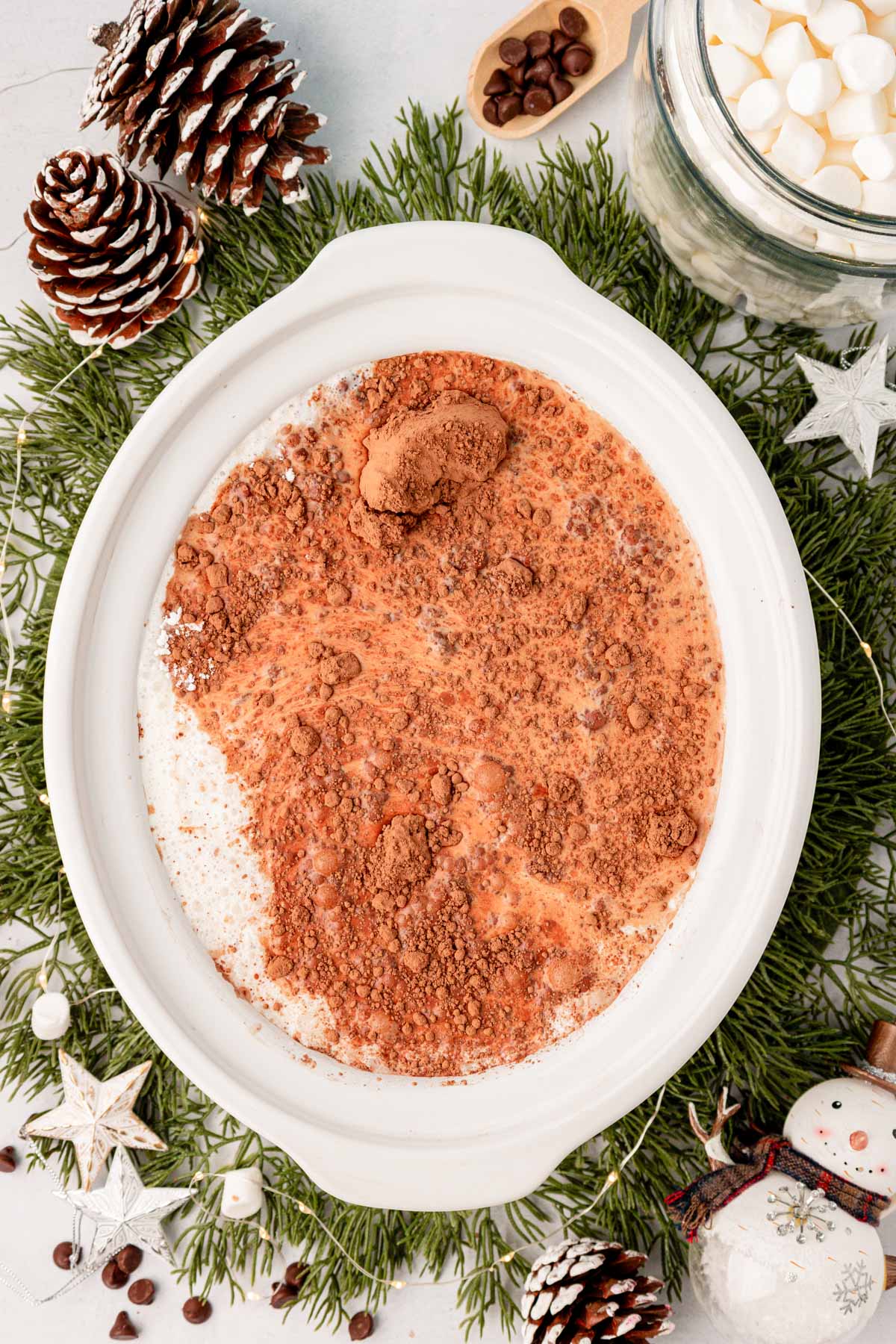 Overhead photo of hot chocolate being made in a crockpot.