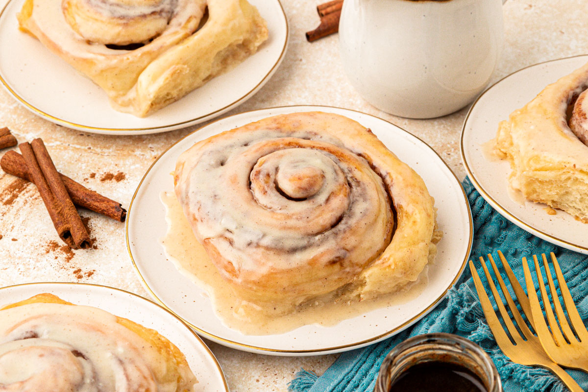 Cinnamon rolls on a white plate.