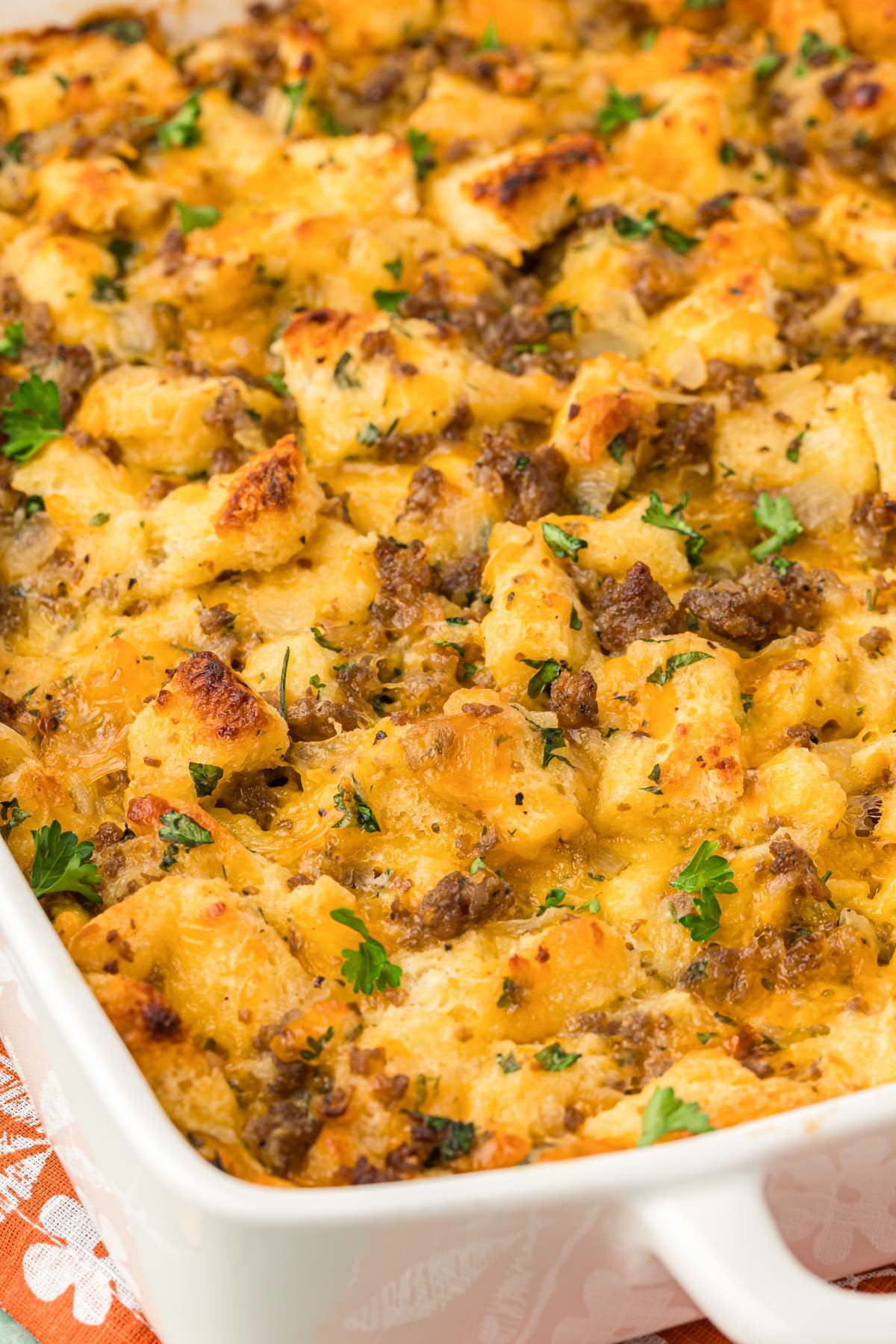 Close up of a sausage breakfast strata casserole in a pan.