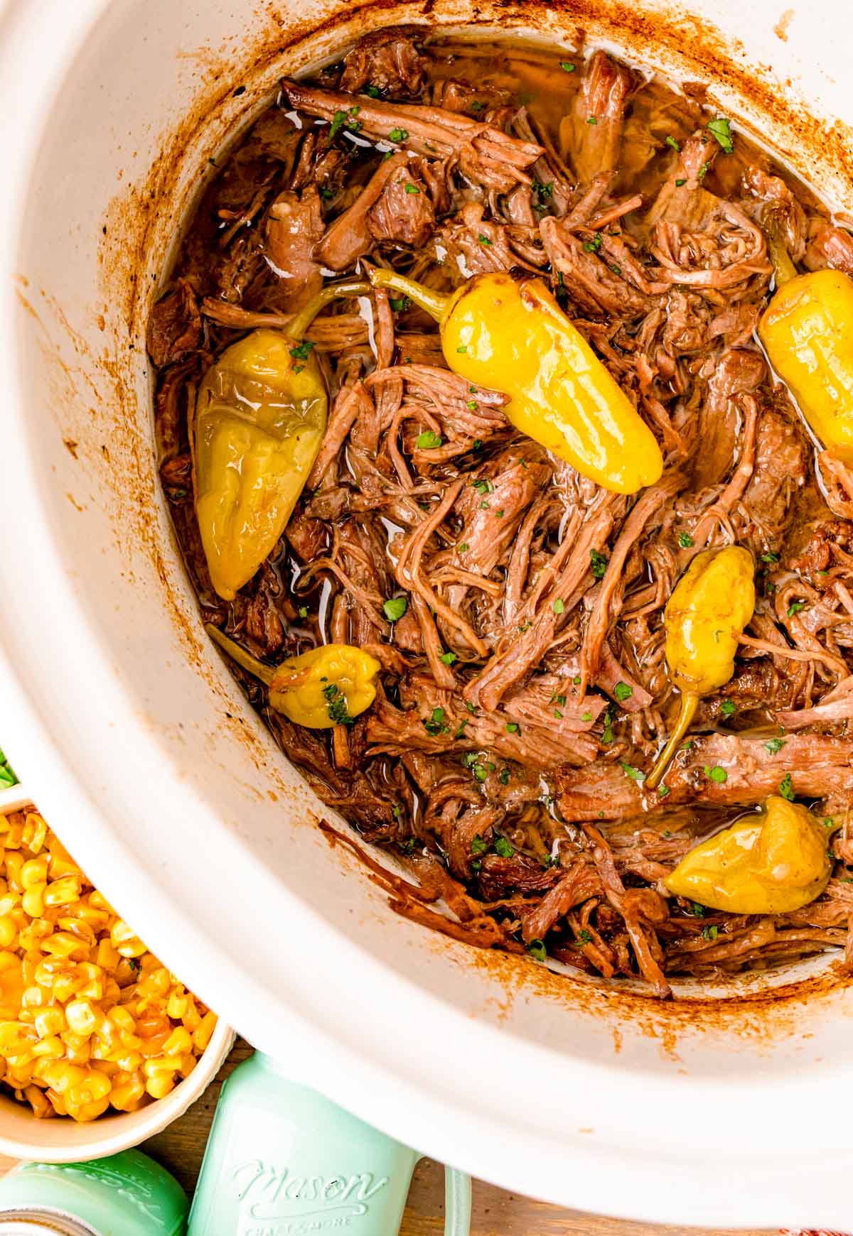 Overhead photo of Mississippi Pot Roast in the slow cooker. 