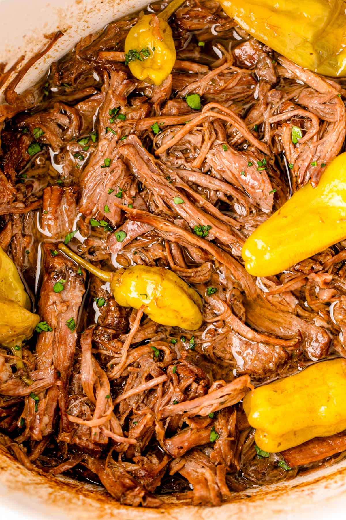 Close up of a Mississippi roast in a crockpot.