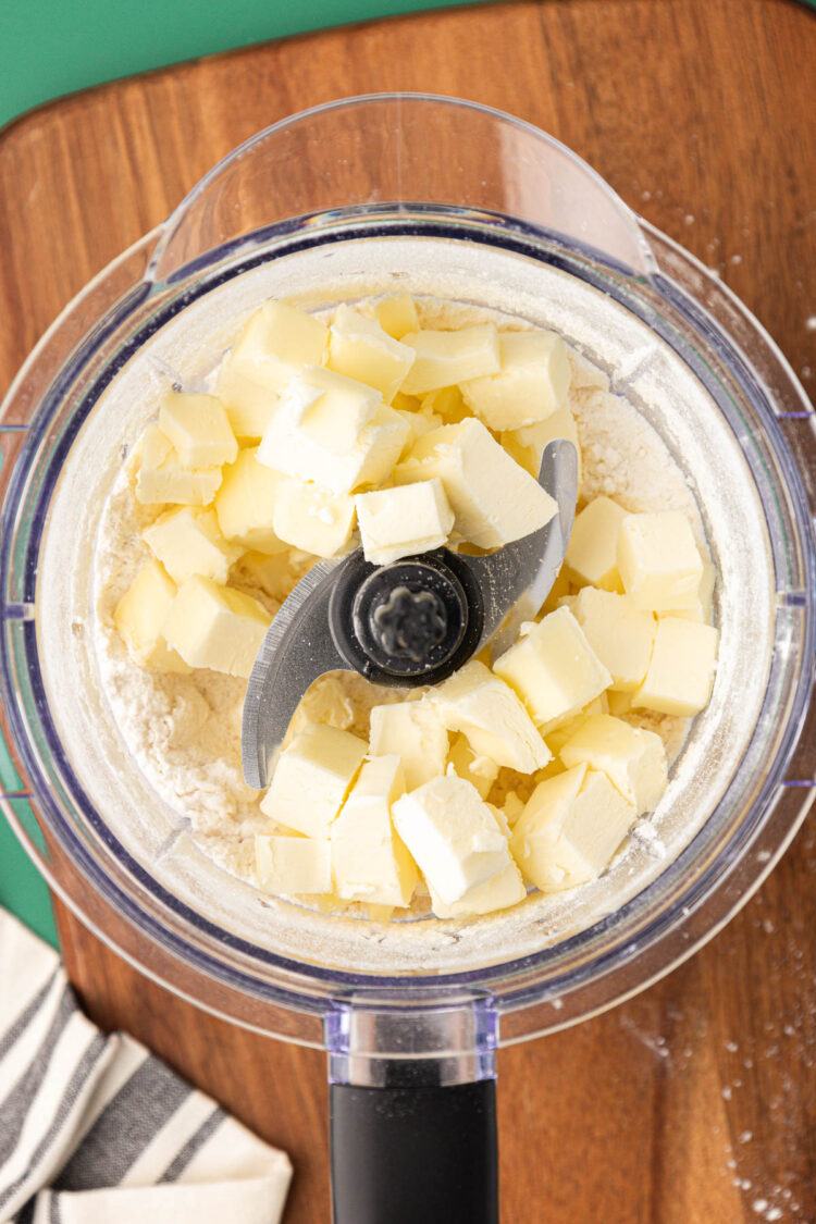 Cubed butter in a food processor with dry ingredients to make scones.