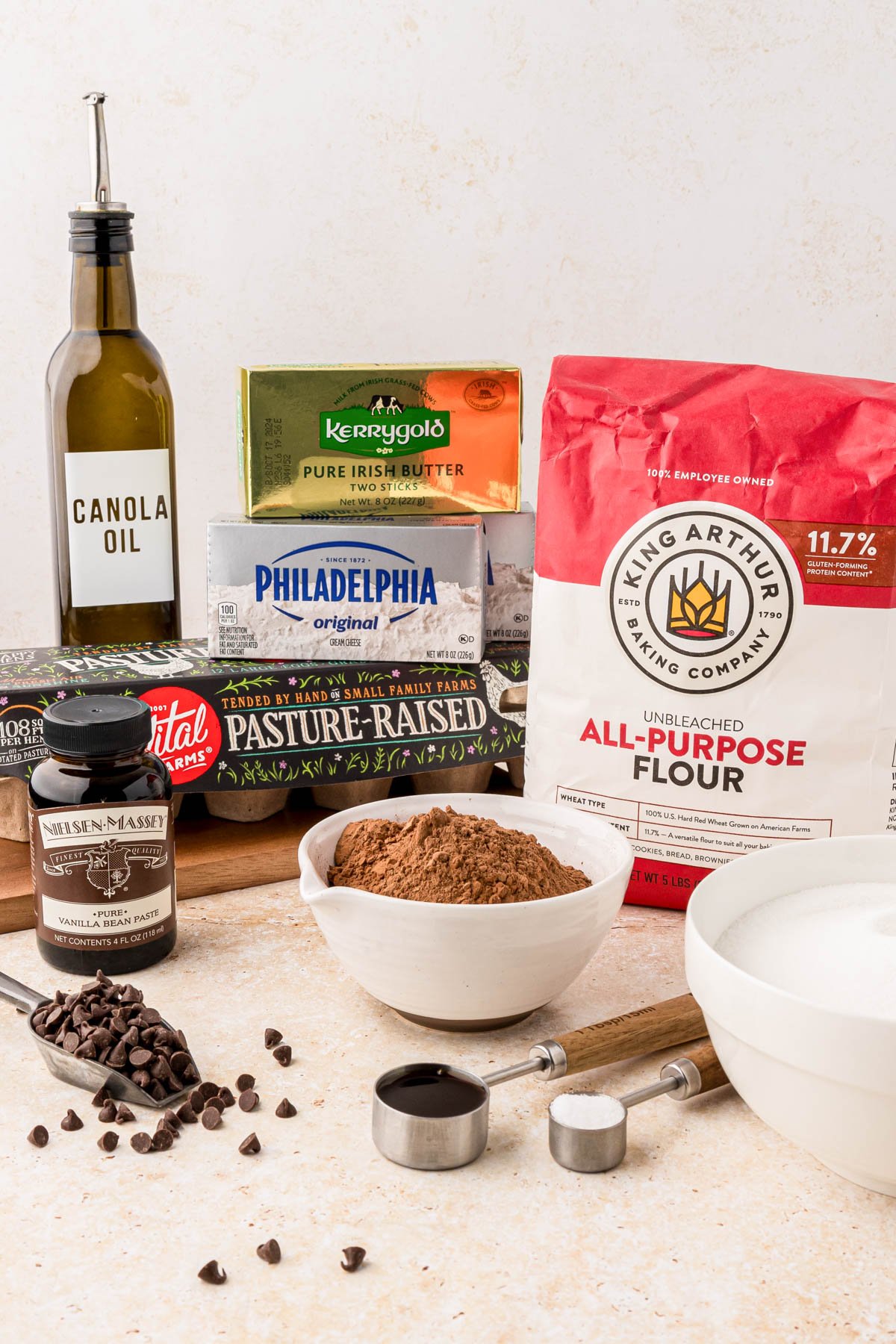 Ingredients to make cream cheese brownies on a table.