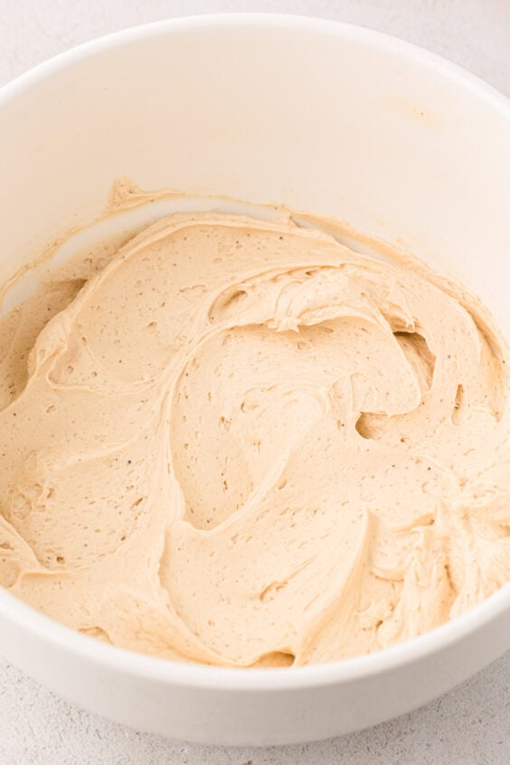 Irish cream frosting in a white bowl.