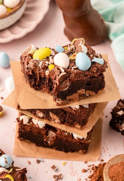 A stack of three Cadbury Egg Brownies on a table.