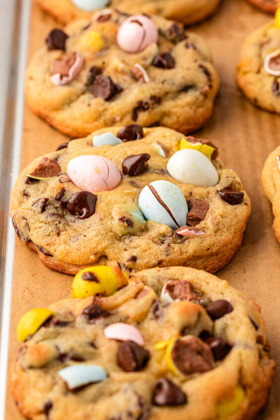 Baked cadbury egg cookies on a baking sheet.