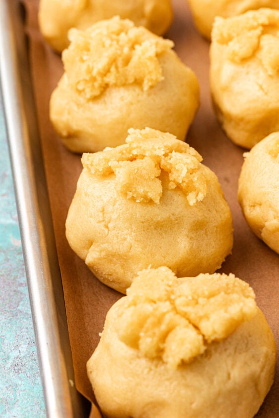 Frangipane filling topped cookie dough balls.