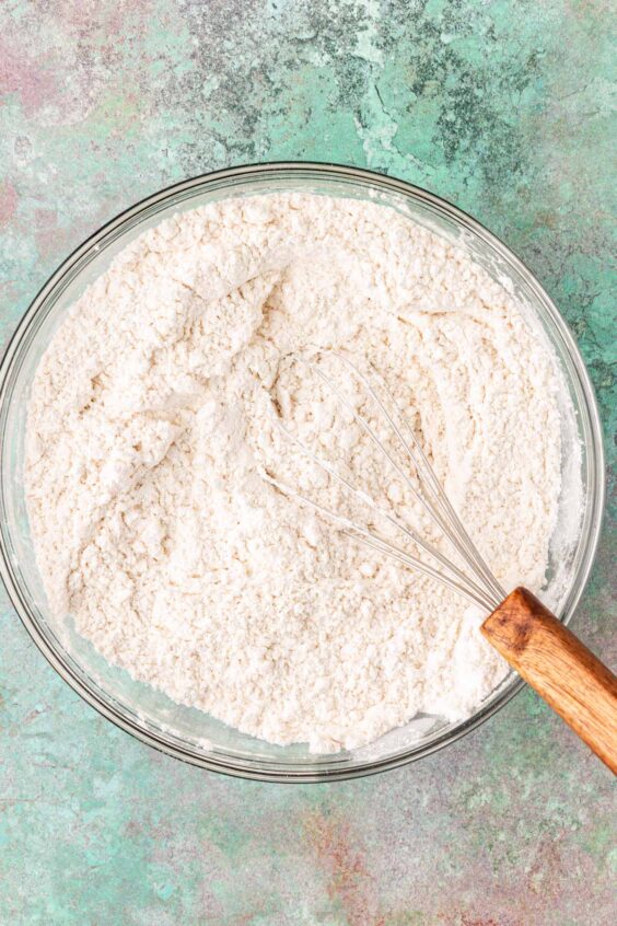 Dry ingredients for cookies being whisked together.