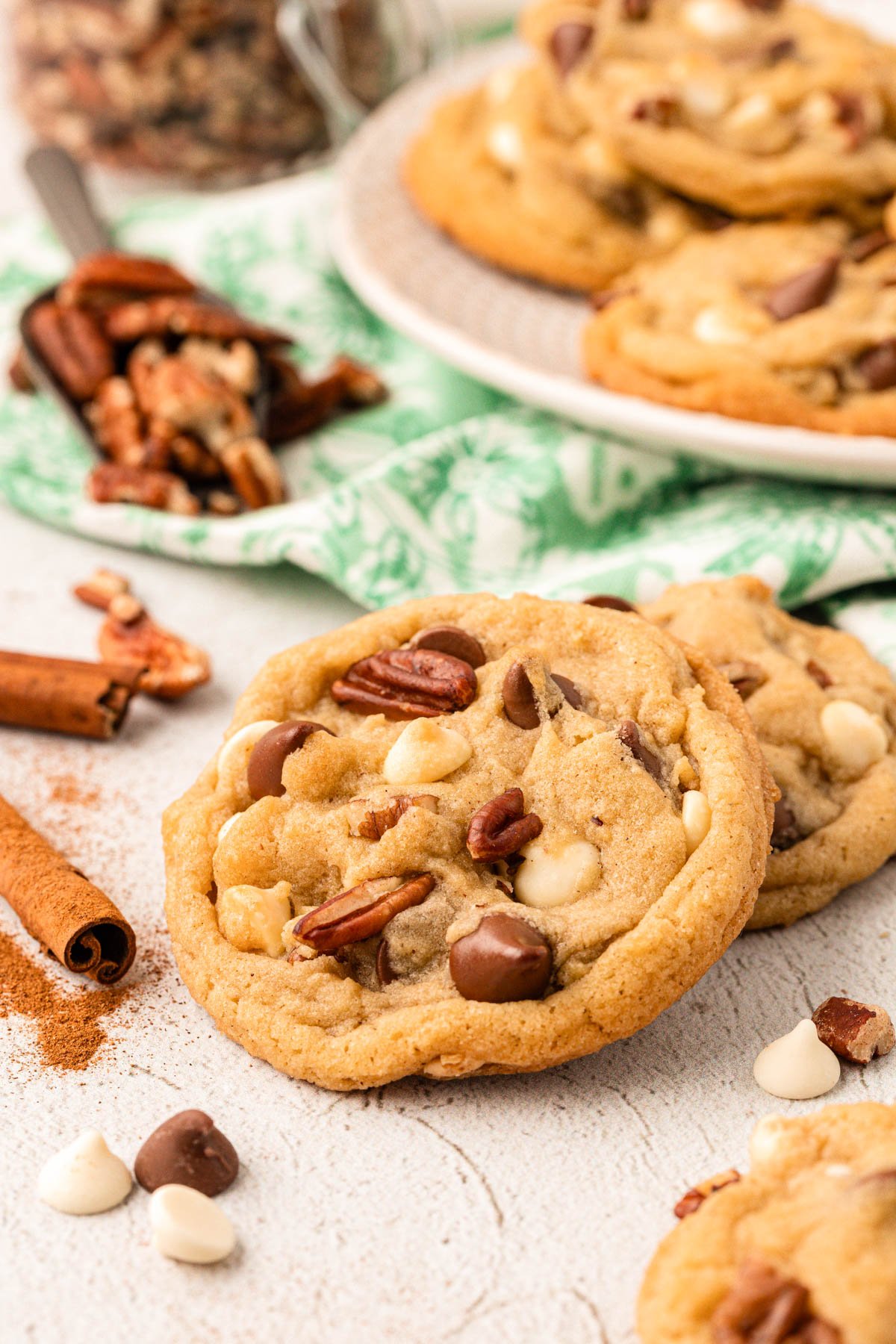 Pecan cinnamon chocolate chip cookies on a table.