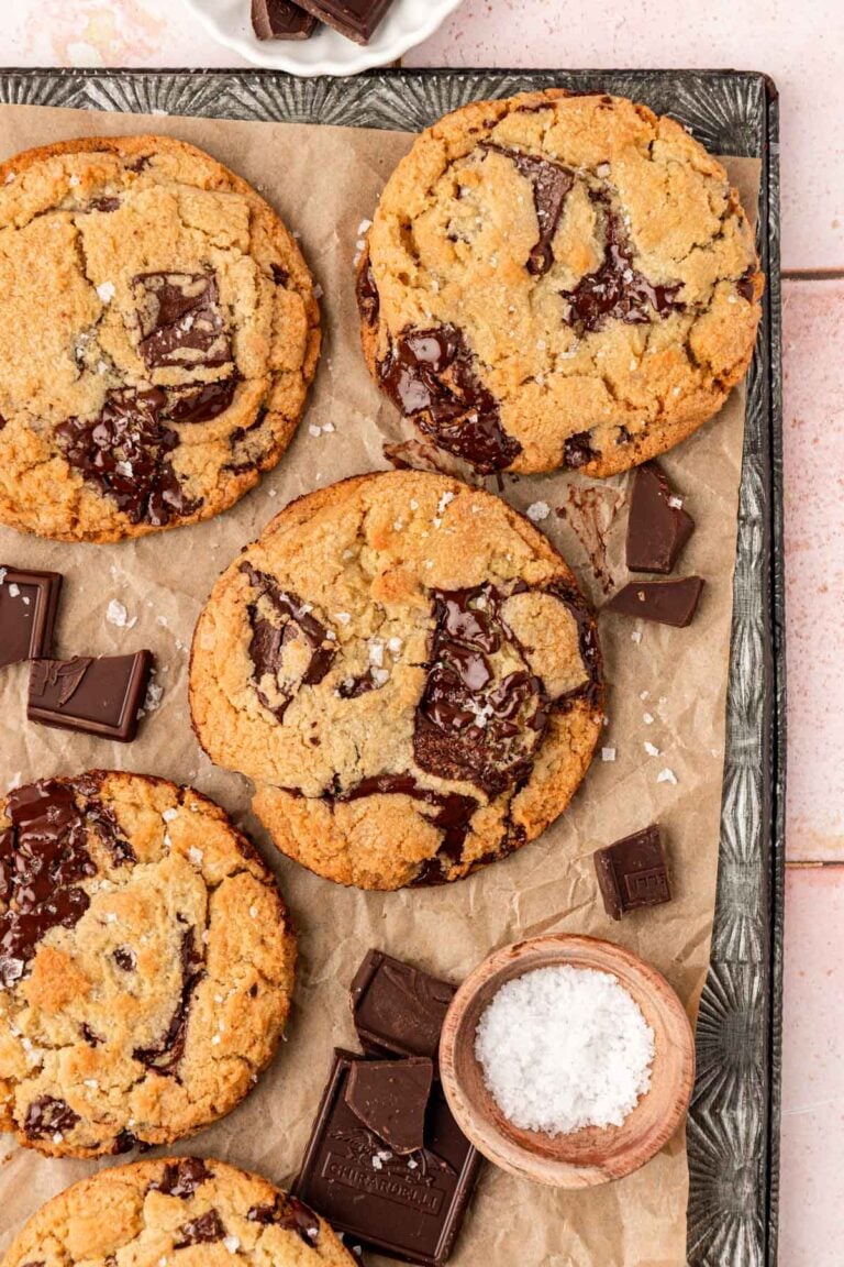 Overhead photo of Jacques Torres Chocolate Chip Cookies on a baking sheet.