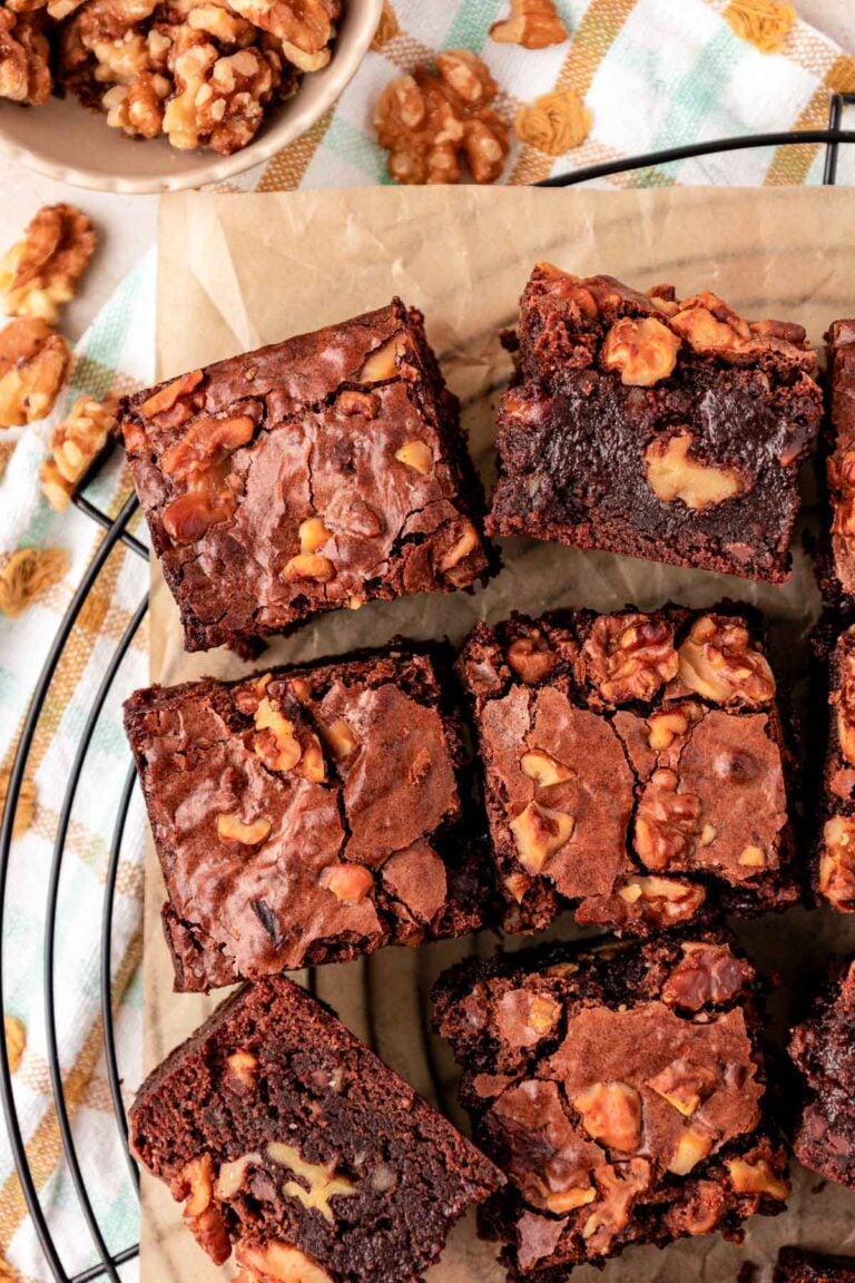 Overhead photo of Walnut brownies slices on a wire rack.