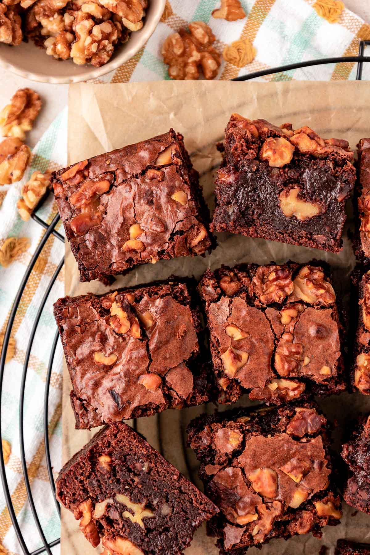 Overhead photo of Walnut brownies slices on a wire rack.
