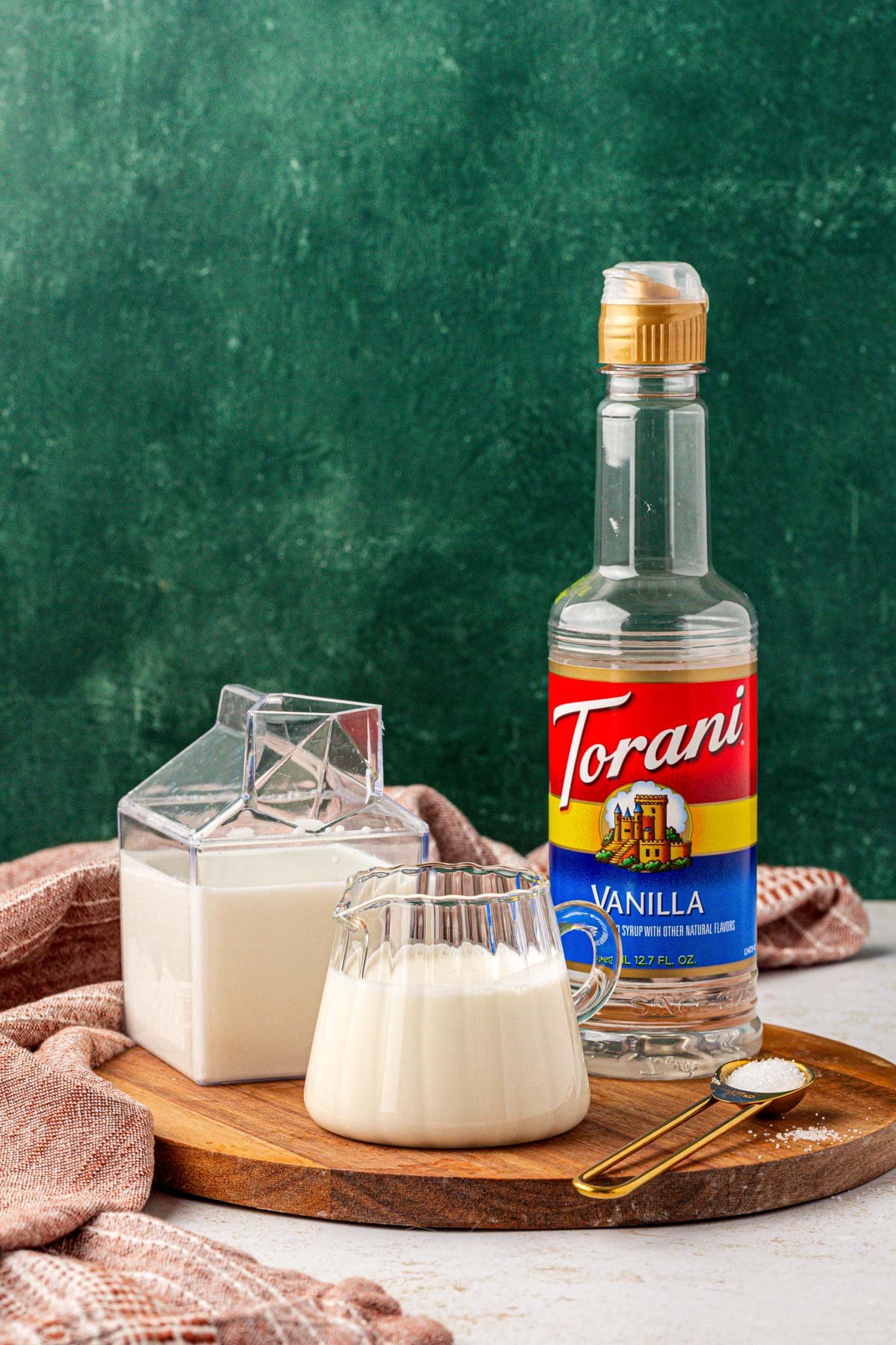 Ingredients to make homemade cold foam on a counter.