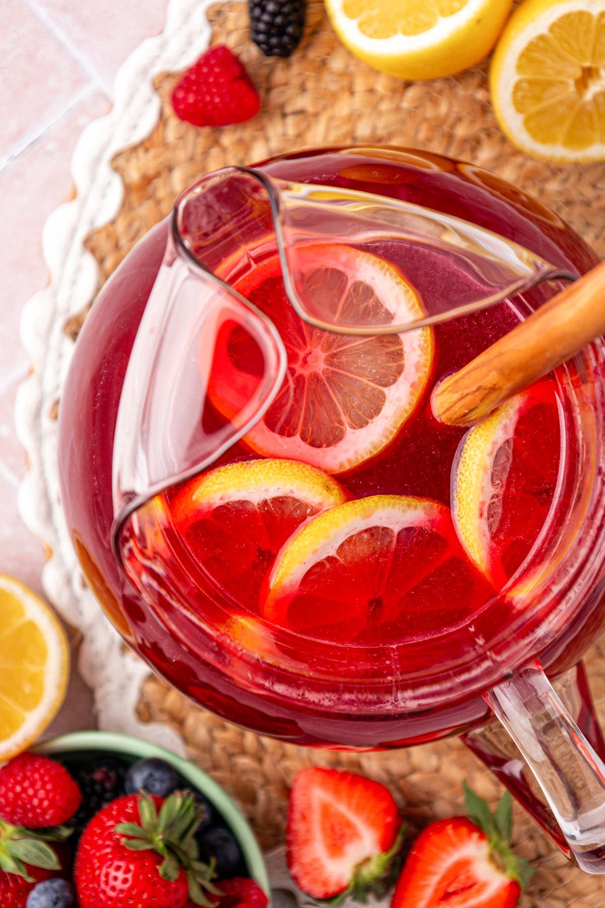 Overhead photo of a pitcher of berry lemonade.