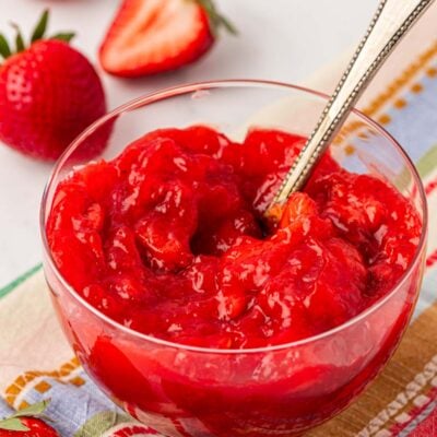 Close up of a bowl of strawberry cake filling.