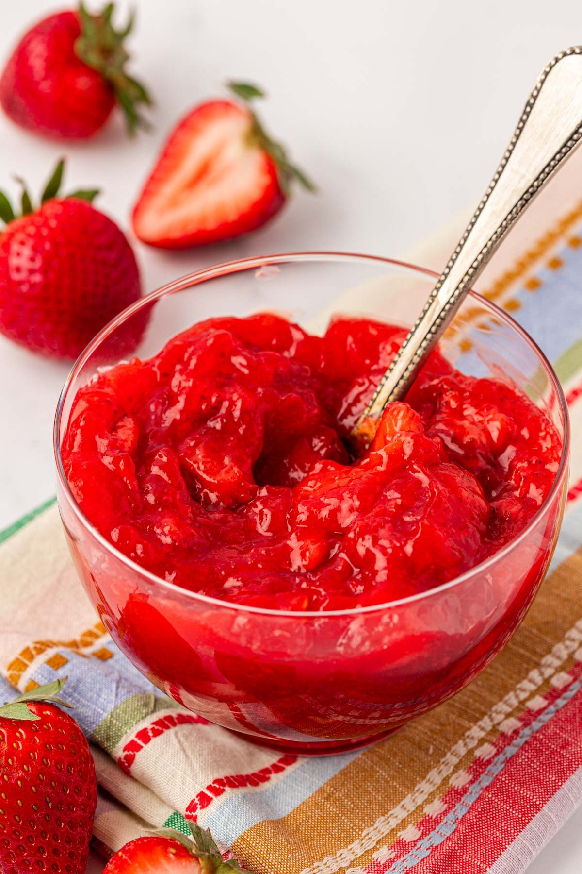 Close up of a bowl of strawberry cake filling.