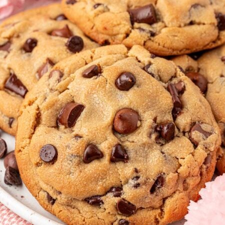 Close up of a big chocolate chip cookie.
