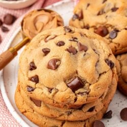 Close up of a stack of peanut butter chocolate chip cookies.