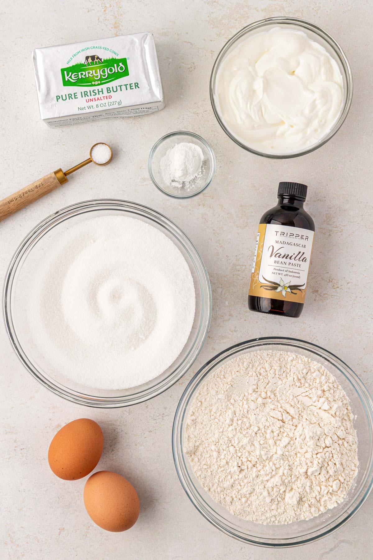 Ingredients to make butter cake on a table.
