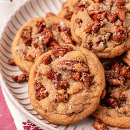 Maple Pecan Cookies on a beige scalloped plate.