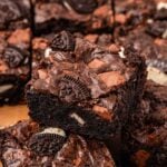 Oreo brownies on a piece of parchment paper.