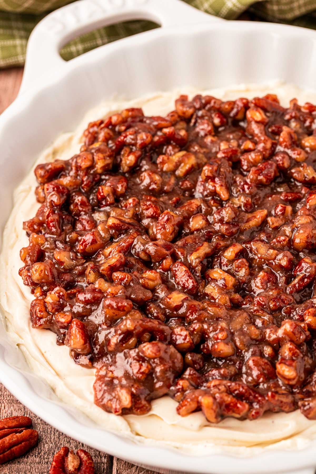 Close up of viral pecan pie dip in a white dish.