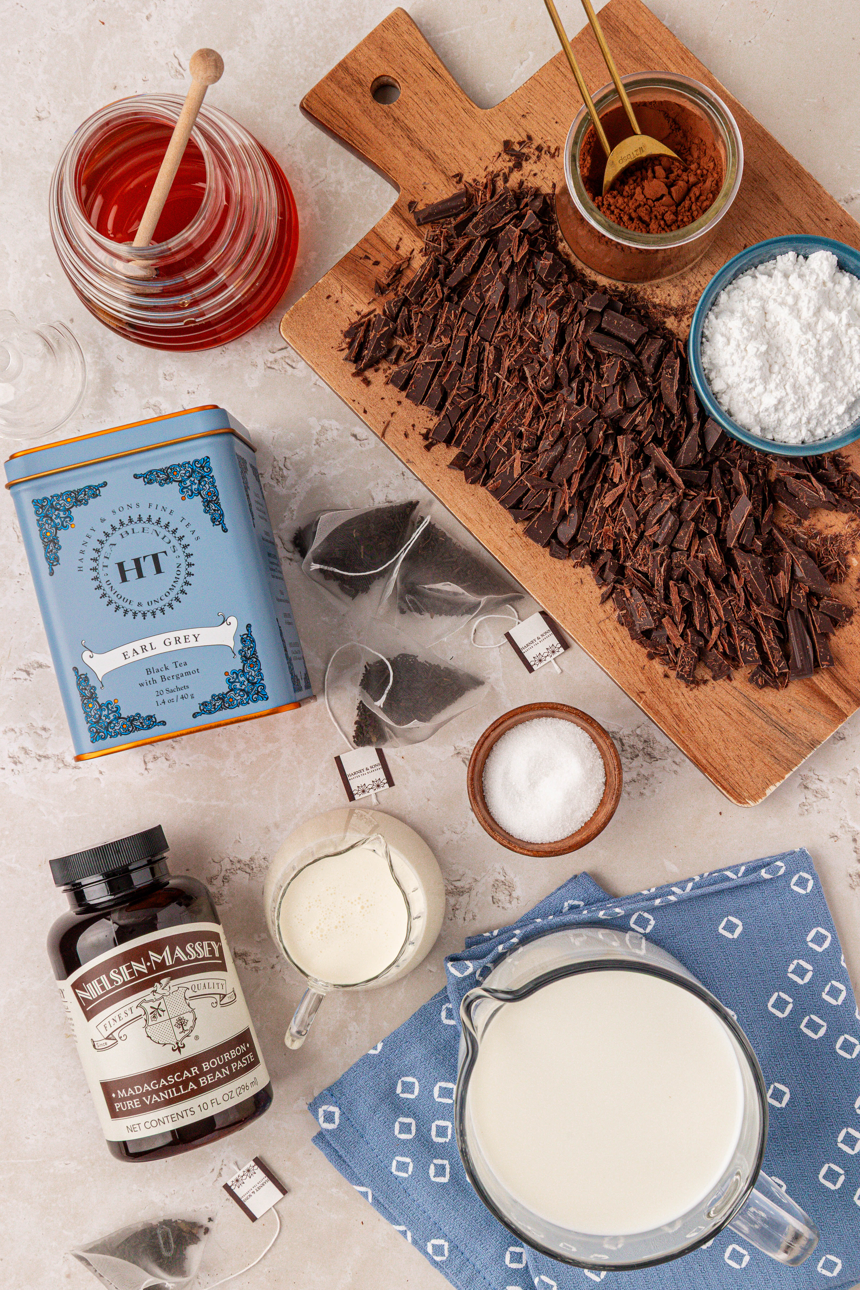 Ingredients to make Earl Grey Hot Chocolate on a table.