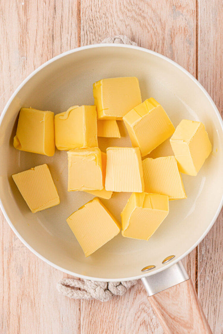 Butter in a pot to be melted.