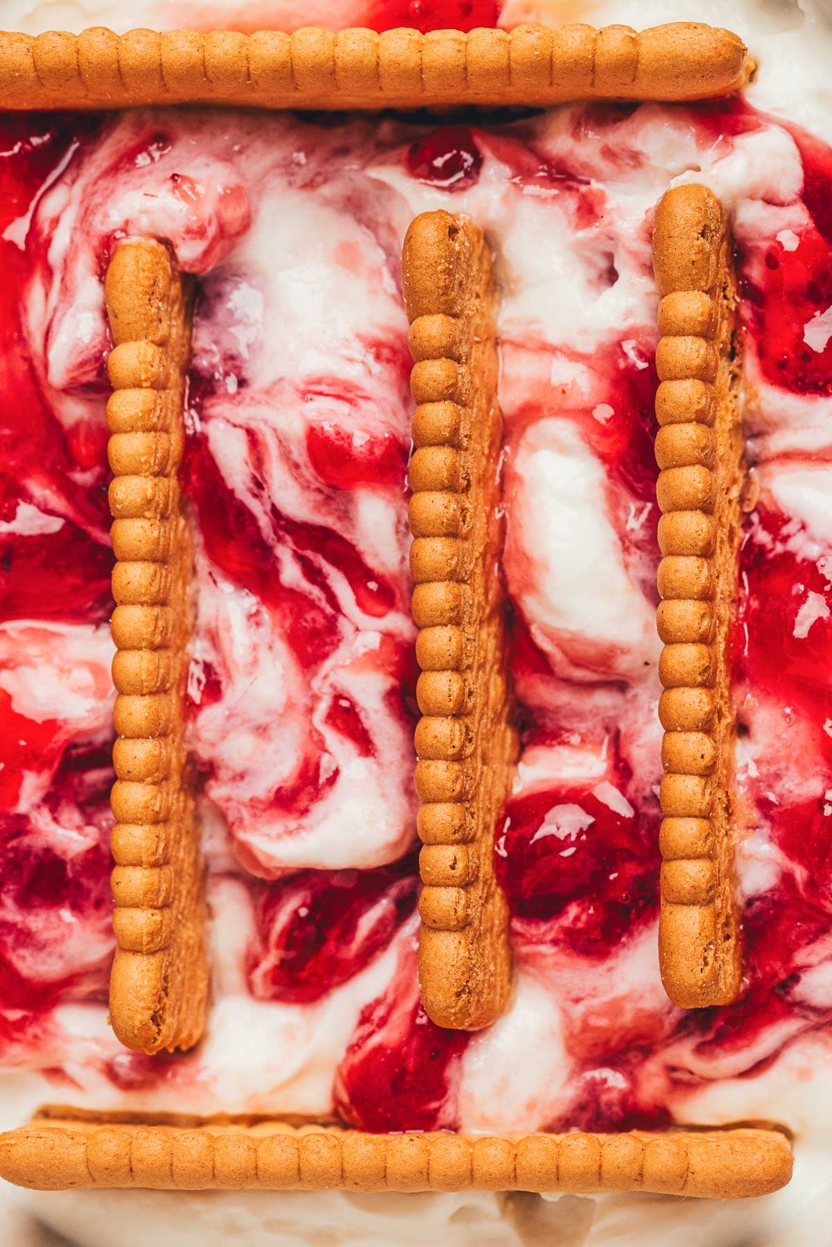 Close up of a bowl of strawberry japanese cheesecake.