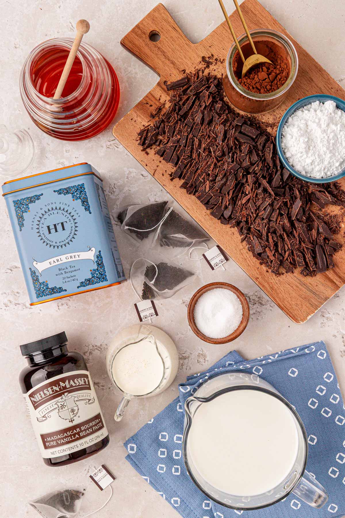 Ingredients to make Earl Grey Hot Chocolate on a table.